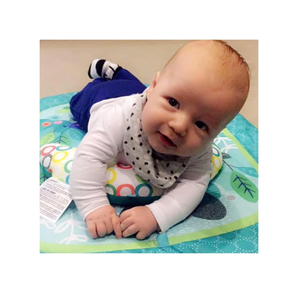 Photo of baby having tummy time as part of occupational therapy